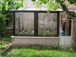 la serre vue de face avec des fenetres de récup