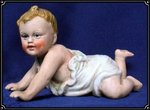 67766521-mignon-bebe-ceramique-biscuit-art-deco.jpg