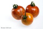 5385977-trois-tomates-heirloom-z-bre-rouge-sur-fond-blanc.jpg