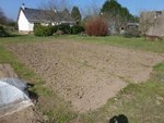 La moitié d'une des 2 parcelles retournée.