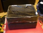 Mon pot fait avec deux bac de polystyrène collé ensemble qui fait office de mini-serre pour l'instant.