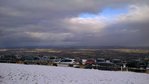 Photo prise à 609m,en bas ce trouve le plateaux de la Dombes.Les étangs ne sont pas visibles d'ici car plus sur la gauche et cachés par les arbres.Beaucoup de monde vient à cet endroit quand il neige,en particulier les lyonnais qui voient rarement les flocons dans la ville.<br />En arrière plan par temps clair on a vue sur les monts du Bugey et les alpes derrière avec le mont blanc.