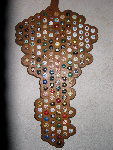 Fait avec les capsules des cages de bouteilles
